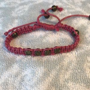 Thread bracelet.